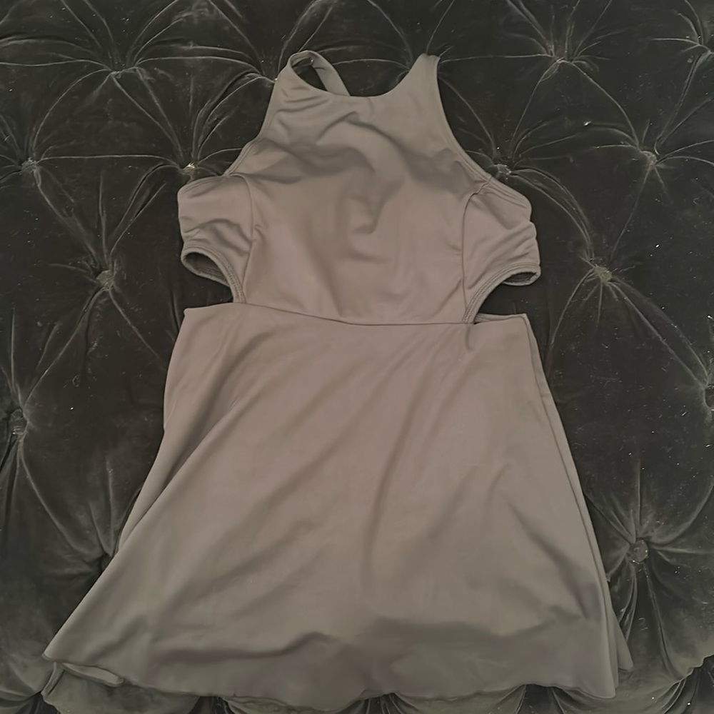 Black tennis dress with built in bra and shorts.  Cut out sides super cute.
